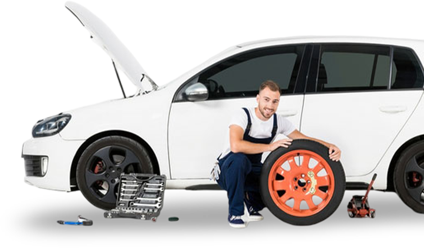 Mann wechselt Autoreifen